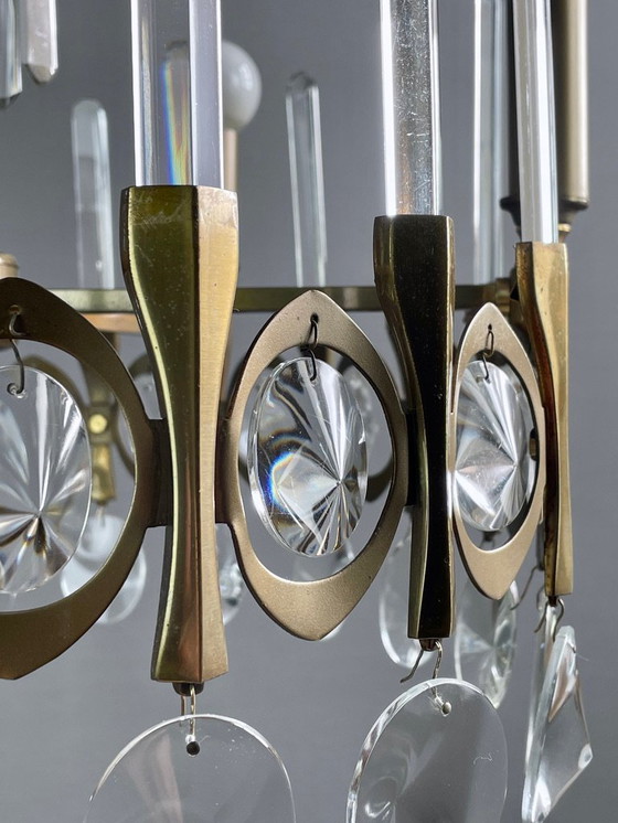 Image 1 of Gaetano Sciolari, five-light chandelier from the "Ovali" series, 1960s. Burnished brass frame and original optical crystals.