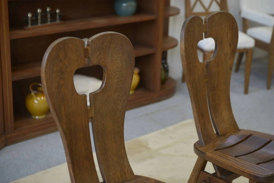 Brutalist pair of chairs by De Puydt in oak, 1960s. – Dining chairs (photo 6 of 9)