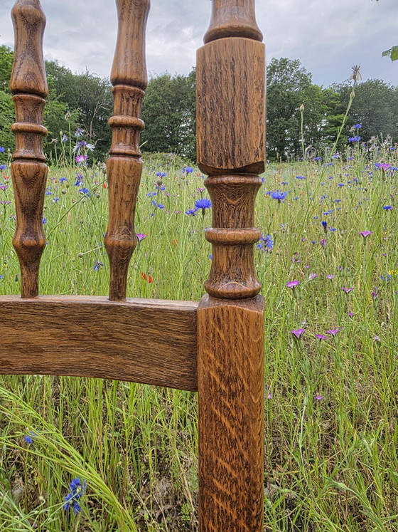 Image 1 of Set van 4 massief eiken stoelen met rieten zitting