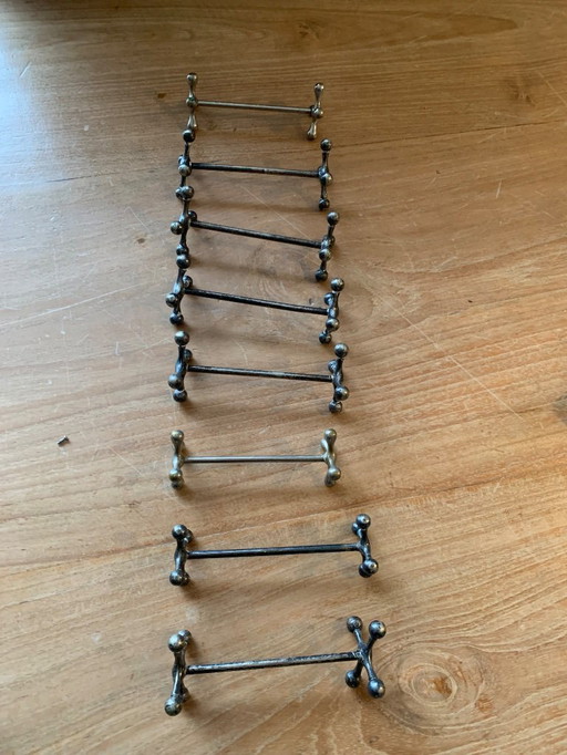 Reposacuchillos de patas cruzadas plateado 8x