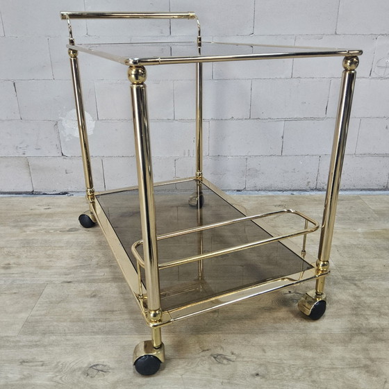 Vintage golden brass bar cart / trolley smoked glass shelves (photo 8 of 15)