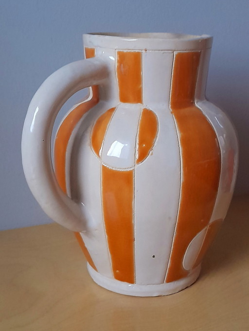Antique glazed ceramic pitcher