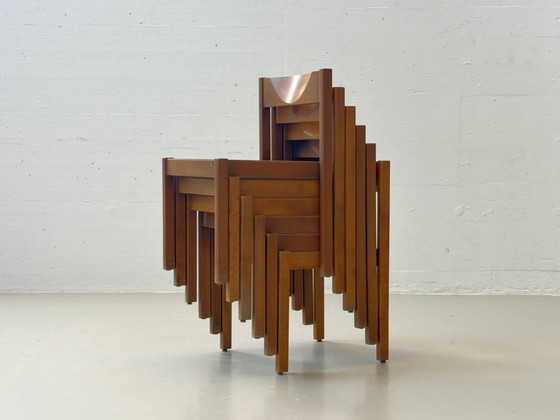 Image 1 of Set van 6 stapelbare houten stoelen in een minimalistisch design uit het midden van de vorige eeuw.