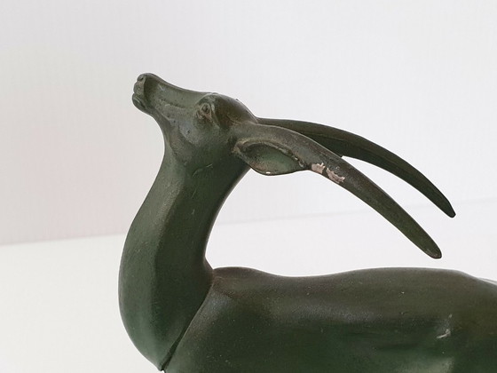 Image 1 of PAIRE DE SERRE-LIVRES BOUQUETINS 1940 1950 VINTAGE EN MARBRE & METAL 40S 50S