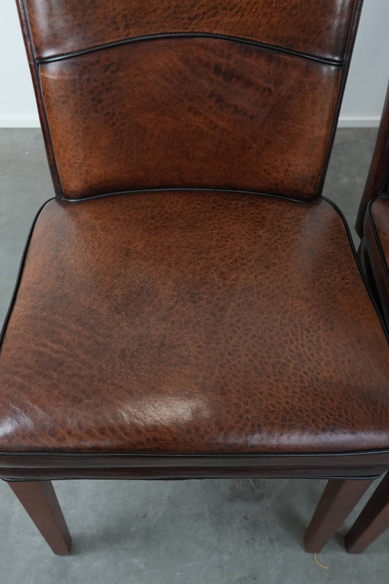 Image 1 of 4 chaises de salle à manger confortables en peau de mouton avec du caractère