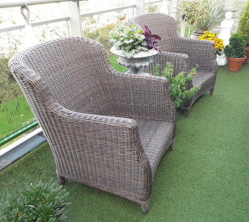 Two four seasons lounge chairs with cushions