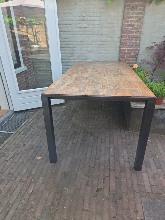 Image 1 of Steel table with teak top