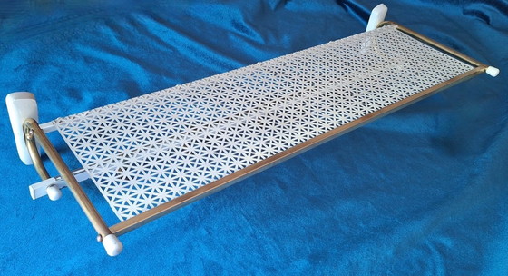 Image 1 of Appendiabiti e cappelliera in ottone e metallo perforato secondo Mategot, anni '60