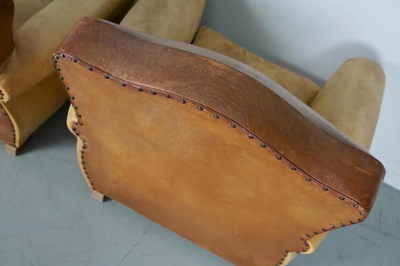 Image 1 of Coppia di poltrone da club francesi in pelle color cognac con schienali a baffo, anni '40