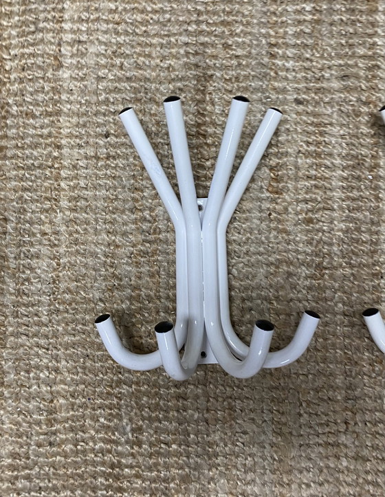 Image 1 of Two vintage heavy metal coat racks