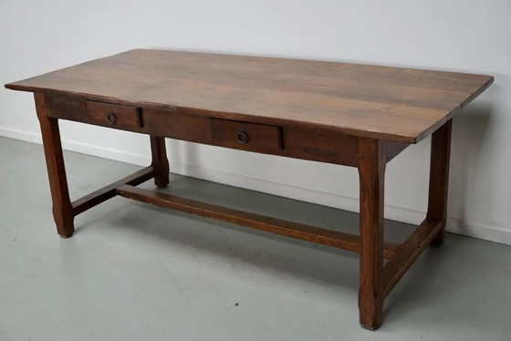 Image 1 of Early 20th-century French rustic country dining table made of oak and elm