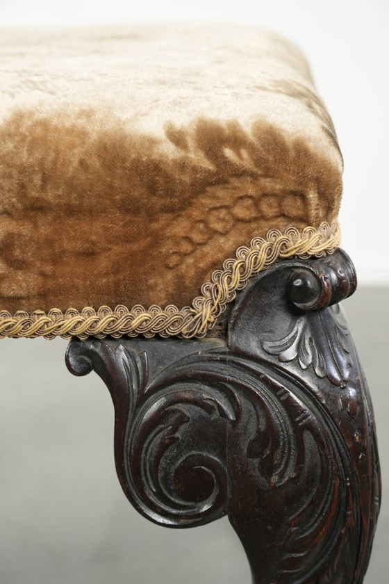 Image 1 of Antiek Hollands zitje/ hocker uit de 18e eeuw met velours stof, mooi houtsnijwerk en klauwpoten