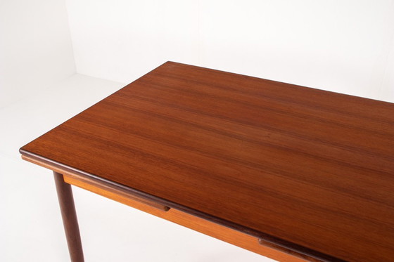 Image 1 of Uitschuifbare eettafel van teakhout in mid-century stijl
