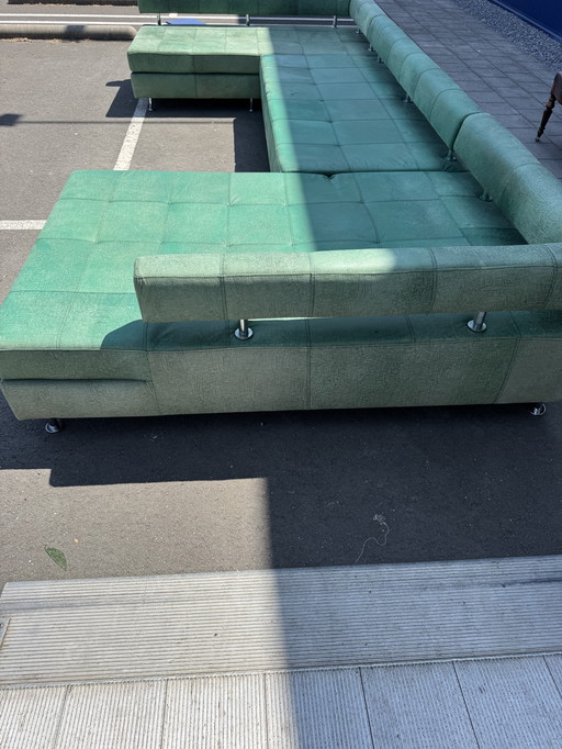 Mega Alcantara corner sofa by DeSede.
