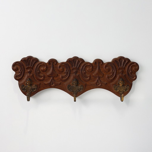 Antique Carved oak Wall mount coat rack with 3 brass angel hooks, France 1900s