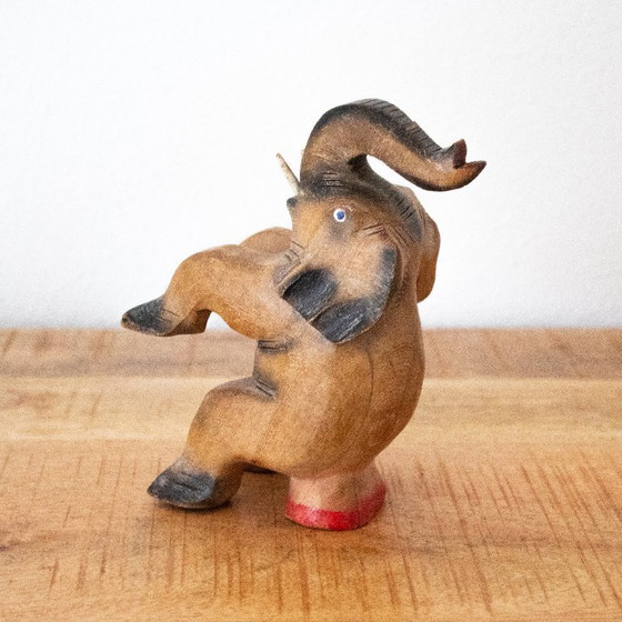 Image 1 of Vintage hand-carved circus elephant figurine: handmade animal sculpture