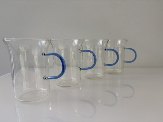 Image 1 of Set of four glass tea mugs with colored handles