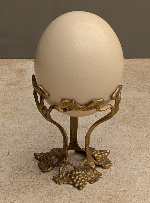 Ostrich egg on Art Nouveau ornament