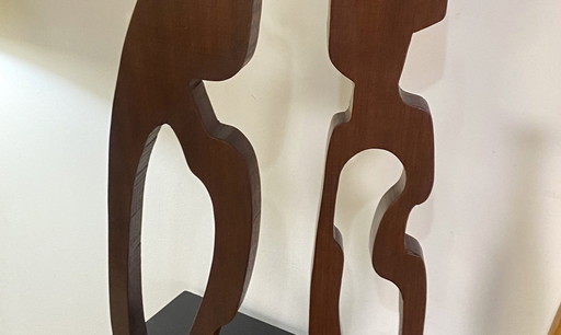 Woman and Child" sculpture