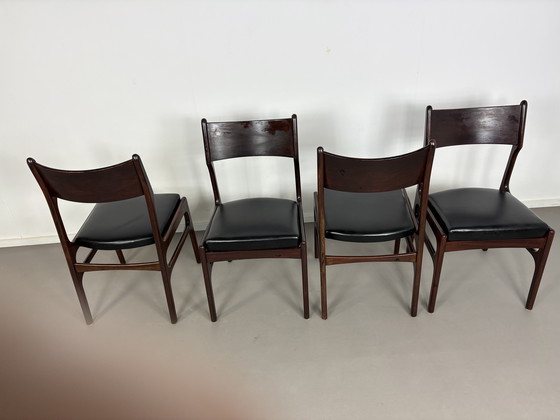 Image 1 of Set off 4 Vintage Palissander Wood With Black skai Leather dining chairs