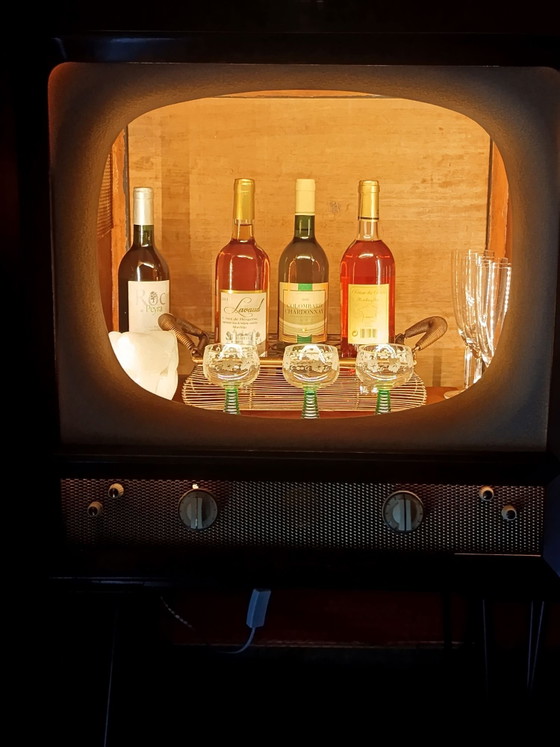 Unique vintage television creatively converted into an illuminated liquor cabinet., Radiobell, Metal, Plastic (photo 3 of 12)