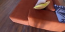Divano angolare modulare 4x6 in velluto color ruggine + pouf