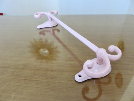 Image 1 of Antique pink enamelled cast iron towel rack