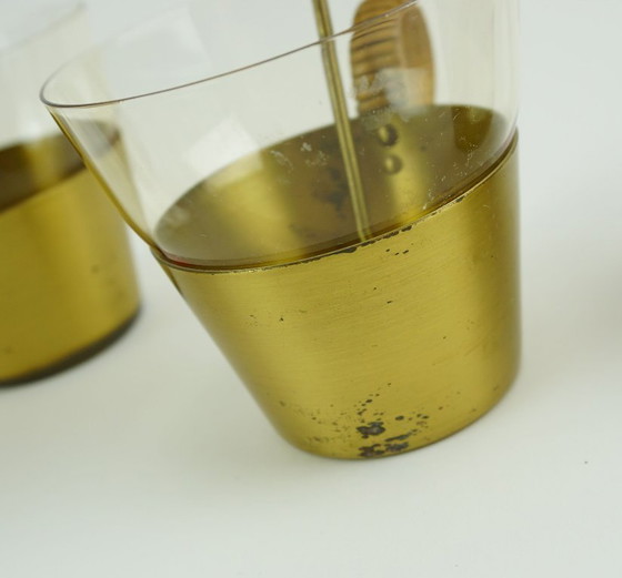 Image 1 of Ensemble de 4 verres à thé style années 50, signés Hein Matten, support en laiton, anses en raphia.