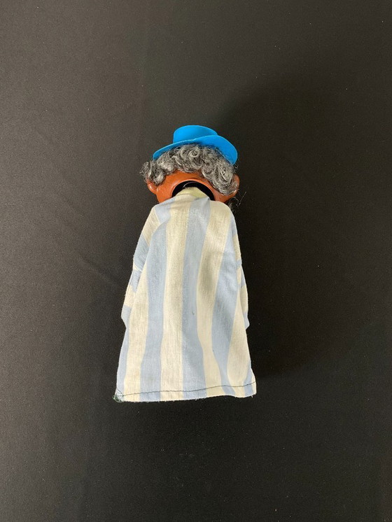 Image 1 of Paar oude bokshandpoppen Aziatische man en clown