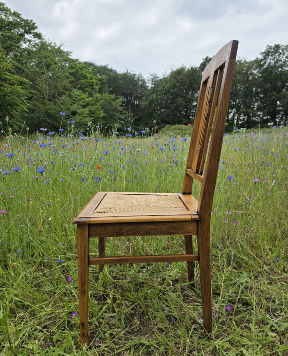 Image 1 of Art Deco eiken stoelen met rieten zitting set van 2