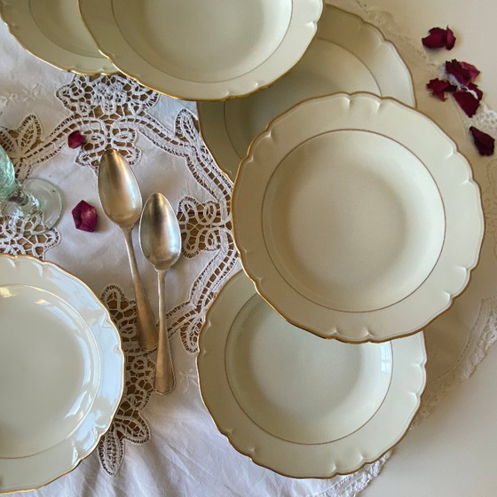 Image 1 of Set of 6 antique off-white porcelain soup plates with gold rim, Limoges ULIM