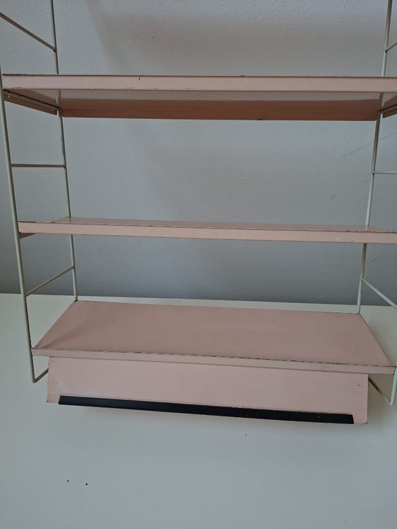 Image 1 of Raro estante de pared con la marca Tomado Holland