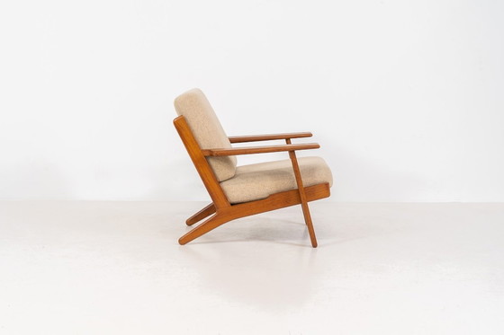 Image 1 of Vroege GE-290 loungestoel in eikenhout van Hans J. Wegner voor Getama (Denemarken, 1953).