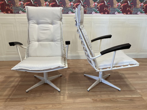 Duo of metal and Bakelite armchairs, 1960 design.