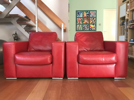 2 fauteuils robustes en cuir rouge