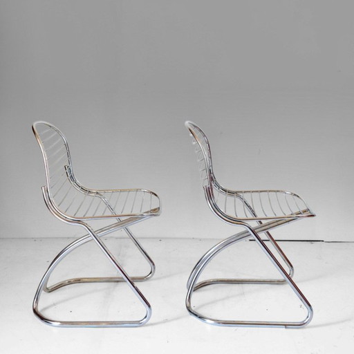 1x Chaises de salle à manger "Flynn" chromées italiennes Space Age de Gastone Rinaldi, lot de deux
