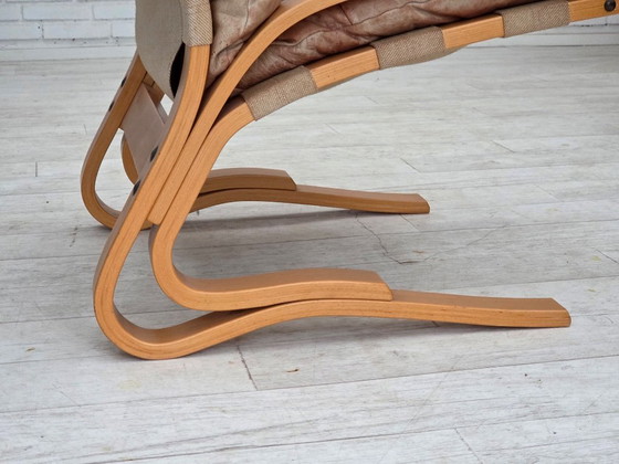 Image 1 of Noorse fauteuil uit de jaren 70, model "Kengu", beige meubelleer.