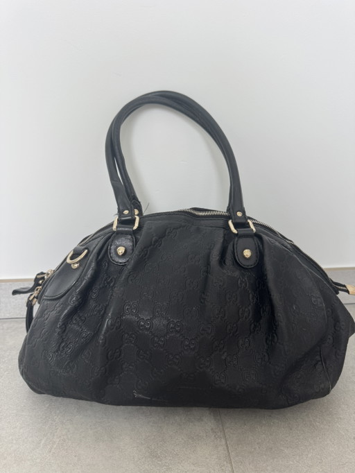 Sac Boston Gucci Guccissima en cuir noir