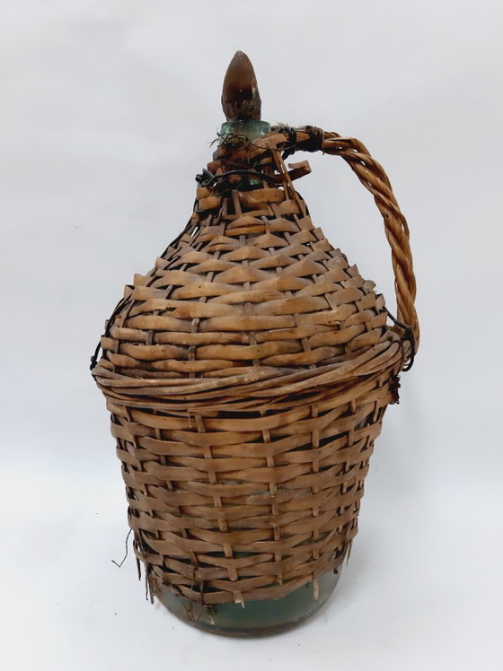 Image 1 of Dame-jeanne ancienne en osier et verre