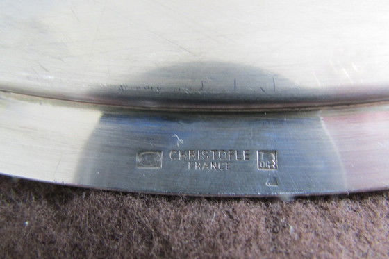 Image 1 of Un plato base plateado de la marca francesa Christofle.
