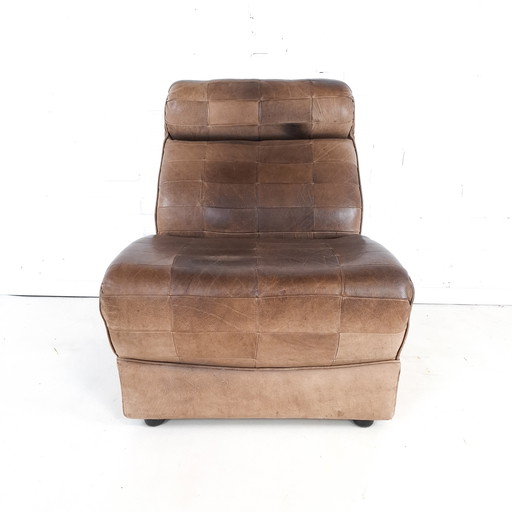 Fauteuil vintage en cuir patchwork