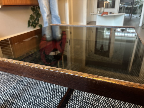 Image 1 of Vintage rosewood coffee table with smoked glass top
