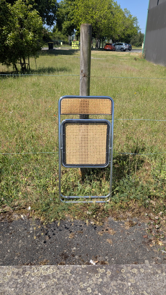 Image 1 of Chaise pliante cannée et acier chromé dans le goût de Castelli, Vintage