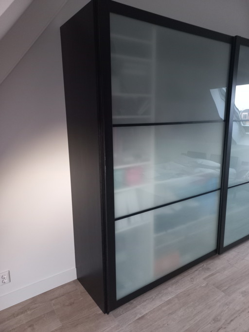 Black bamboo finished Pax wardrobe.