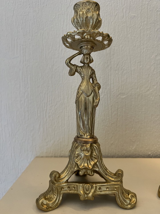 Image 1 of Pair of Empire style bronze candlesticks with female and male figurines
