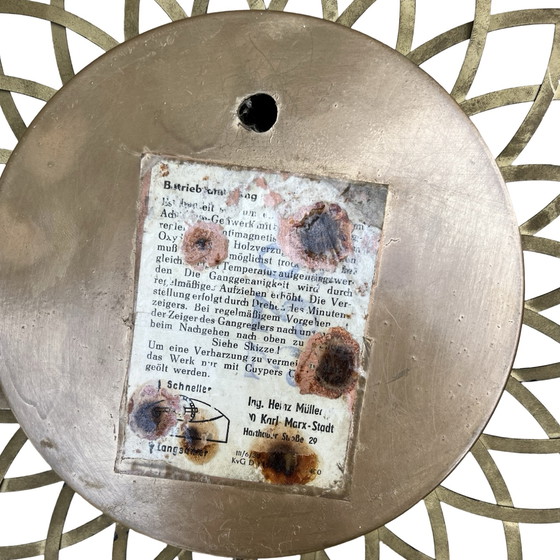 Image 1 of Mechanical sun hanging clock, Müller, Germany, 1960s.