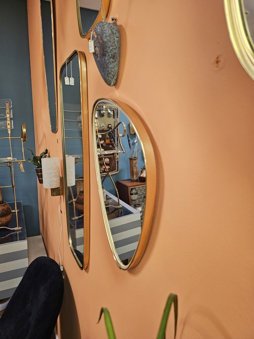 Miroir organique avec bordure couleur laiton