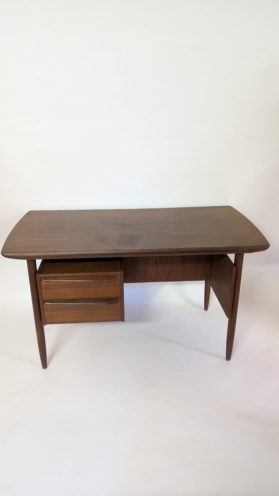 Image 1 of Iconic Mid-Century Teak Desk by Tijseling for Hulmefa made in the 1950s.