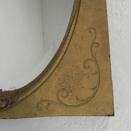Image 1 of Gold oval mirror with cut edge, 1950s