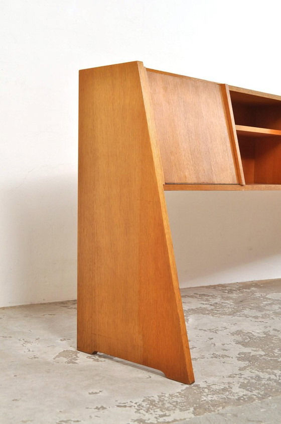 Mid-century sideboard with slanted front, 1950s – Wood (photo 4 of 13)